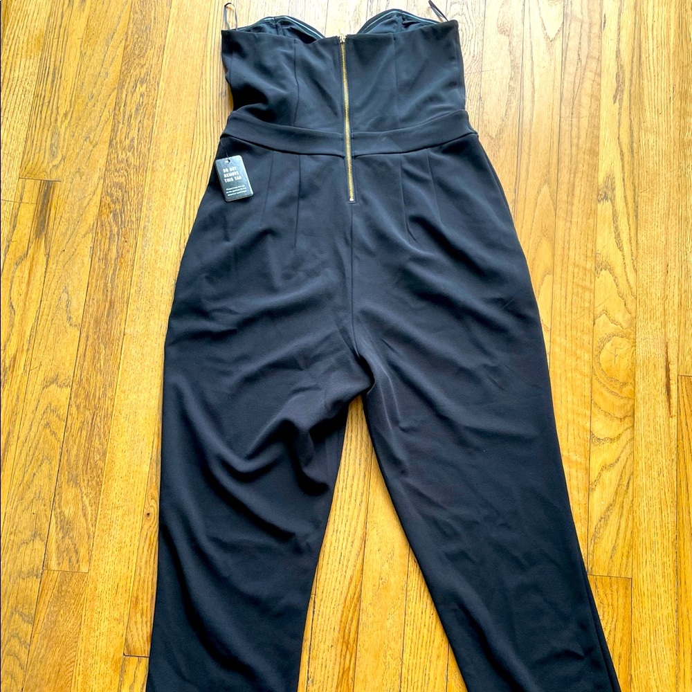 Brand new all black jumpsuit from Express